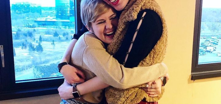 casey and cassandra hugging and smiling at the camera, march 2019